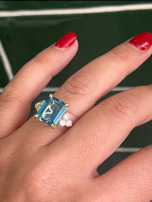 London Blue Topaz and Diamonds in 18ct Yellow Gold.