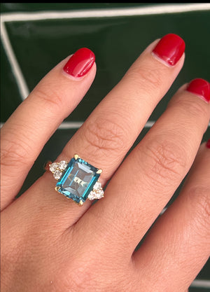 London Blue Topaz and Diamonds in 18ct Yellow Gold.