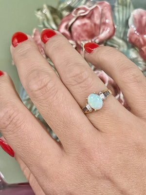 Opal, Sapphire and Diamond ring in 9ct yellow gold